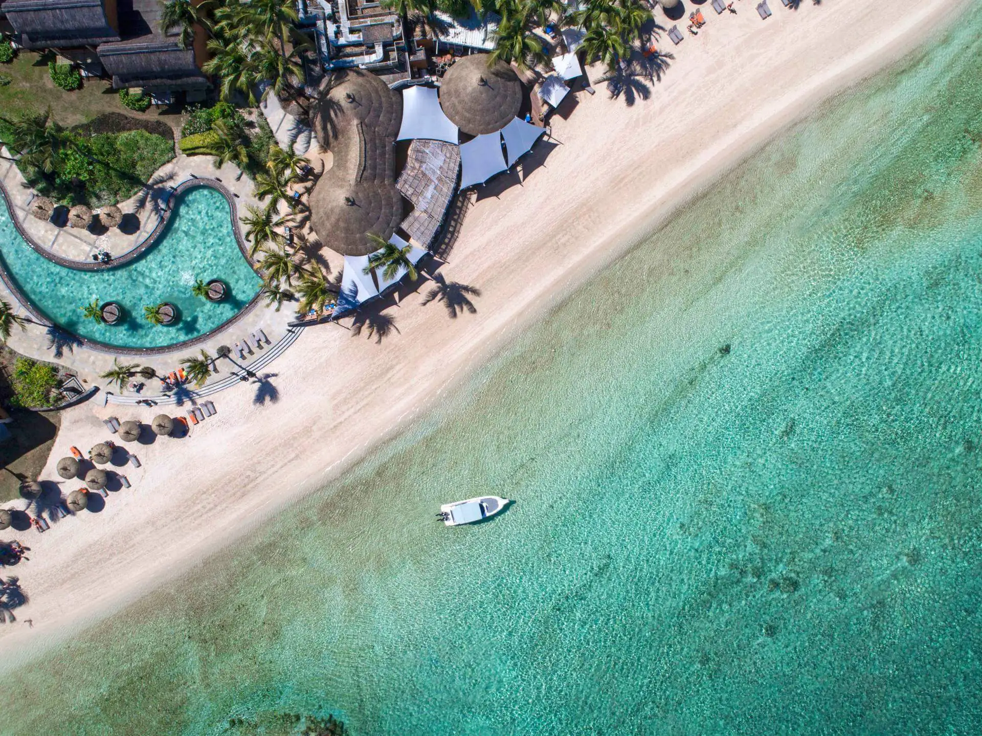 Aerial Beach and Pool view of Heritage Awali.webp