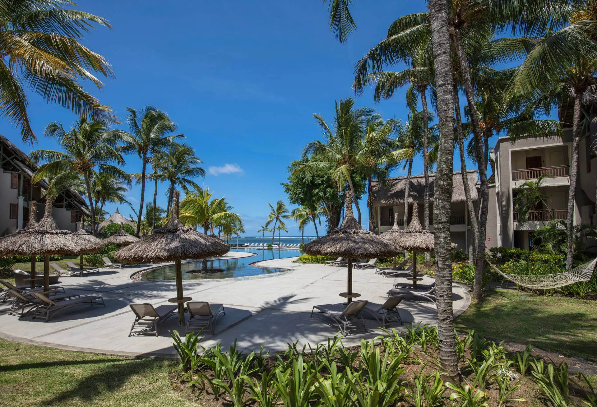 Garden pool view of Heritage Awali.webp