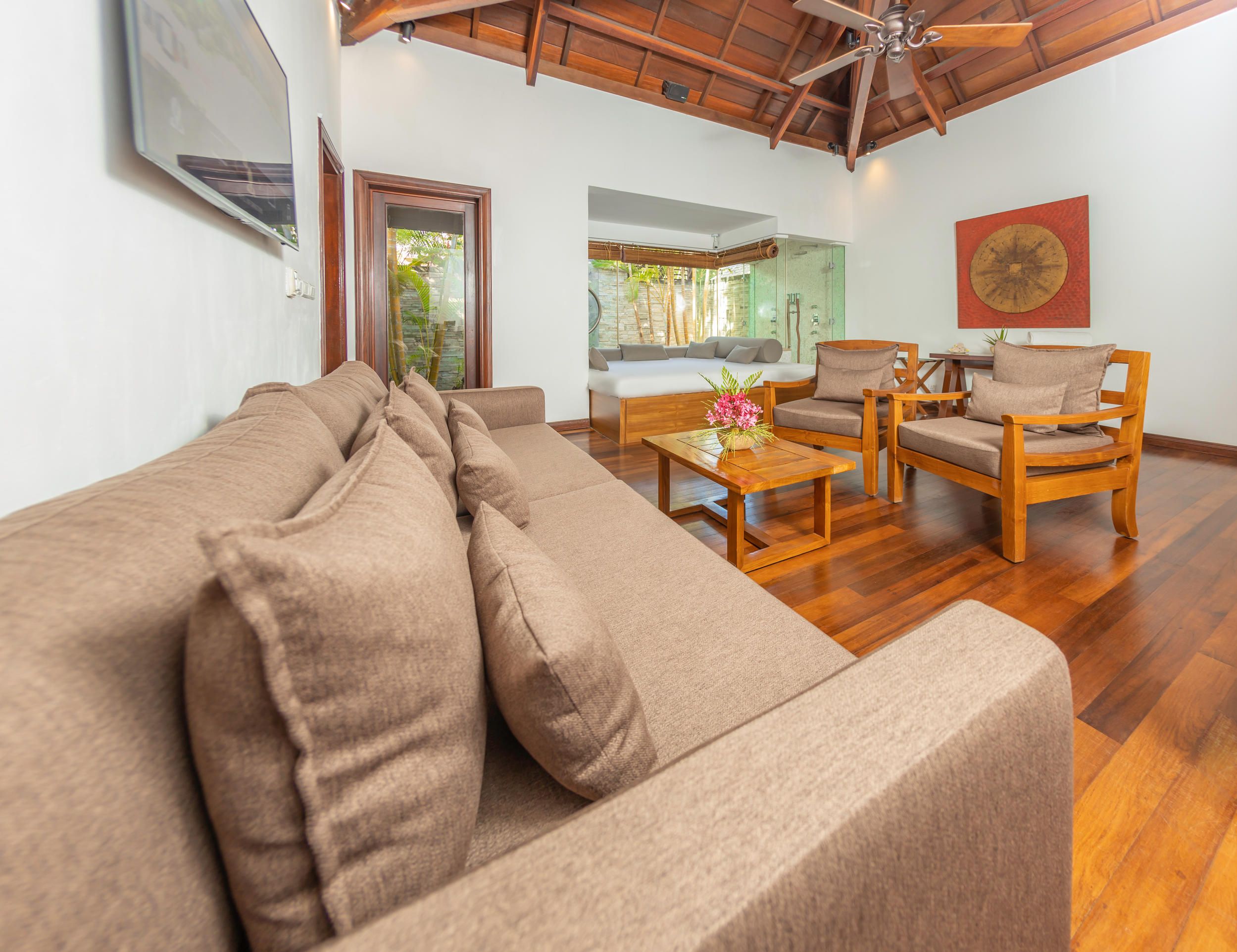 Shanti Maurice Resort and Spa - Departure Lounge_Living area overlooking the bed _ shower area.jpg
