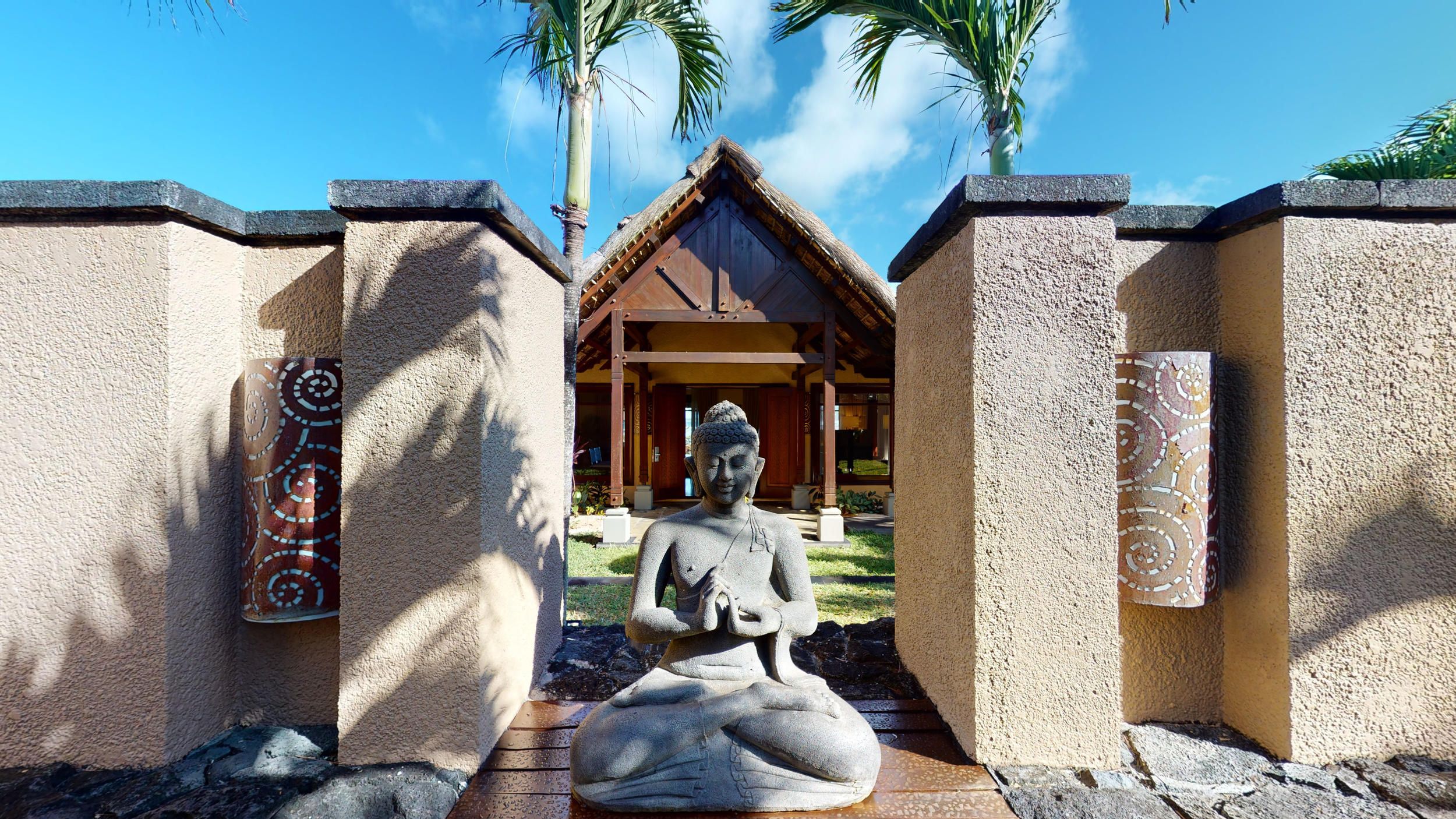 Shanti Maurice Resort and Spa - Shanti Villa_main entrance with Buddha.jpg